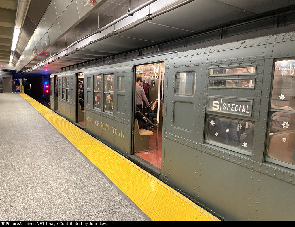 The NYCTA Holiday Train Awaits a Green Light for departure from 96th Street Station on Manhattans Upper East Side 